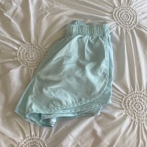 baby blue nike running shorts